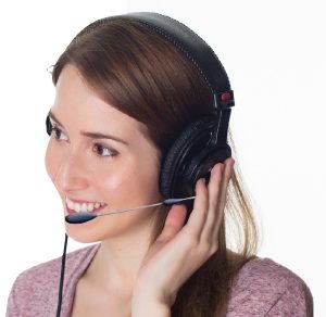 Call center agent speaking with customer.