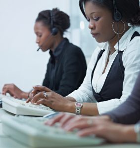 Reduce hold times: three people at their keyboards.